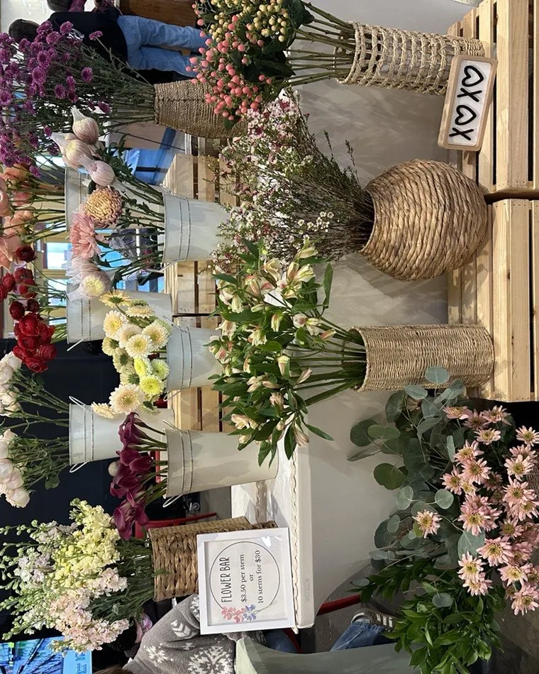 Flower bar display at a First Fridays community night