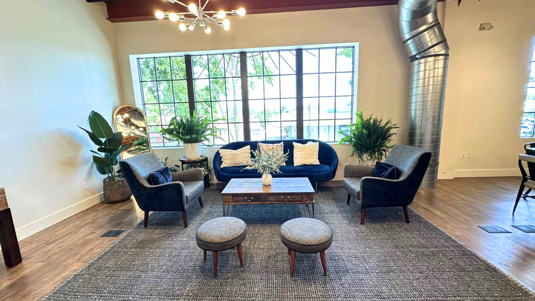 Cozy seating area with blue velvet couch